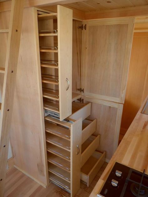 This is the Payette Model by TruForm Tiny House. The great part of this build is how much you can customize it. Below you’ll see both a loft and ladder set-up, and they have additional option… Dold Dörr, Tiny House Storage Ideas, Vstupná Hala, Tiny House Storage, Small Kitchen Storage, Best Tiny House, Tiny House Inspiration, Tiny House Kitchen, Tiny Spaces