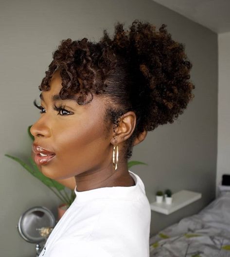 20 Hottest Afro Puff Hairstyles Worth Trying in 2023 Afro Puff With Bangs, Drawstring Afro Puff Hairstyles, Afro Puff Hairstyles Black Women, Puff Ball Hairstyle Natural Hair, High Puff Hairstyles, Natural Puff Hairstyles, Puff Hairstyles, Hair Poof, Afro Puff Ponytail