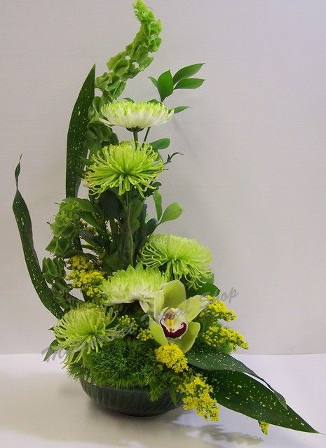 St. Patrick's Theme Get Well | Rhonda | Flickr Asymmetrical Flower Arrangement, Asymmetrical Arrangement, Contemporary Flower Arrangements, Modern Floral Arrangements, Orchid Leaves, Altar Flowers, Corporate Flowers, Arrangement Floral, Ikebana Flower Arrangement