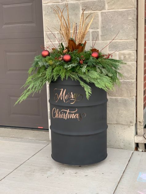 Steel Drum Ideas, Whiskey Barrel Christmas Ideas, Barrel Christmas Decor, Christmas Bon Bon, Christmas Urns, Steel Drums, Barrel Decor, Christmas Pots, Christmas Planters