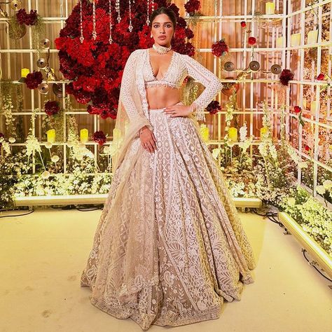 The gorgeous @bhumipednekar stuns in our handcrafted nude colour lehenga. Enhanced with ivory threads, sequin, and pearl embroidery, she… | Instagram Pearl Tassels, Seema Gujral, Bhumi Pednekar, Nude Colour, Wedding Lehenga Designs, Pearl Embroidery, Net Lehenga, Indian Couture, Lehenga Designs