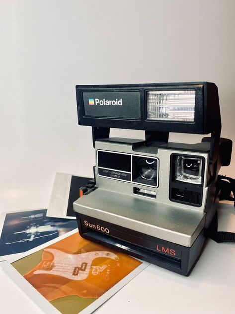 The iconic Polaroid 600 instant film was first introduced in 1981 for its 600 series cameras, and continued throughout the ’90s and 2000s. Polaroid 600, Instant Film, Instant Camera, 90s Nostalgia, The 90s, Cameras, Film