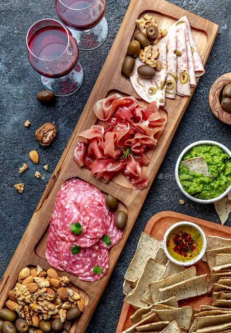 Antipasto Platter. Ham serrano, salami olive jamon dip sauces and red wine by lblinova. Antipasto Platter. Ham serrano, salami olive jamon dip sauces and red wine. Top view #Sponsored #salami, #olive, #jamon, #serrano Salami Presentation, Salami Photography, Ham Platter, Dip Sauces, Antipasto Platter, Food Cafe, Tapas Recipes, Spanish Tapas, Gourmet Desserts