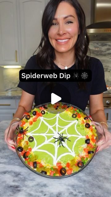 Genevieve LaMonaca on Instagram: "Spiderweb Dip🕷️🕸️Follow @chefgenevieve for 50 Halloween inspired recipes. This is a great option as a savory dish for your next spooky party 👻  Spiderweb Dip:  Ingredients 1 20.5oz can refried beans 1 packet taco seasoning 3 large hass avocados 2 limes, juiced 1 tsp salt 1/2 cup sour cream 1/2 cup Shredded cheese 1 roma tomato, diced 1/4 cup canned diced jalepenos 1/4 cup sliced green onions 1/4 cup sliced black olives 1 Bag El Super Fresh Tortilla chips   Directions:  Mash refried beans with taco seasoning. Spread evenly into a pie dish.   Blend together avocados, lime juice and salt until smooth. Spread on evenly onto the refried beans  For the spiderweb effect: add sour cream to a piping or resealable bag and snip off a little from the tip. Pipe a sp Spider Web Layered Taco Dip, Spider Web Taco Dip Recipe, Spiderweb Taco Dip, Spider Taco Dip, Halloween 7 Layer Dip Spider Webs, Halloween Bean Dip, Spiderweb Dip, Fresh Tortilla Chips, Halloween Taco Dip