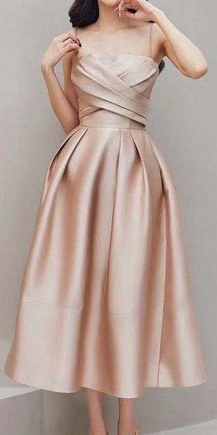 This beige shiny dress is made of a very high-end thick fabric. The dress was designed to raise your feminity and elegance in a classy way. Elegant Midi Dress Classy Simple, Elegant Midi Dress Classy, Cocktail Dress Classy Evening, Midi Dress Classy, Elegant Knee Length Dresses, Classy Midi Dresses, Dresses Knee Length, Shiny Dress, Printed Prom Dresses