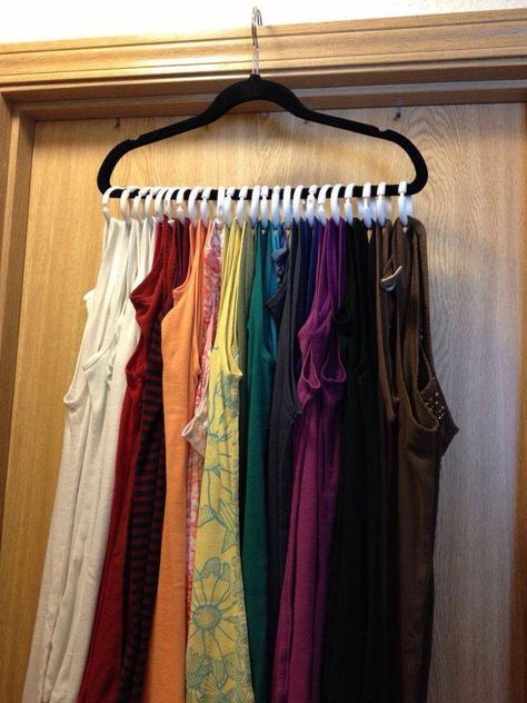 Great space saver!!! Use shower curtain rings and put them on a hanger to use as a way to hang all of your tank tops on one hanger. Would work for scarves, too! Dorm Closet Organization, Dorm Room Closet, Dorm Closet, Eclectic Glam, Closet Room Organizer, Scandinavian Eclectic, Closet Organization Ideas, Clothes Closet Organization, Dorm Room Organization