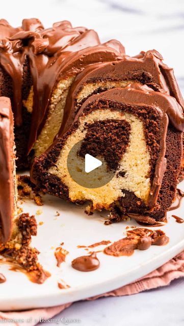 Elizabeth Waterson on Instagram: "🍰Marble Bundt Cake🍰 is when you need both vanilla and chocolate! This cake quickly became a favorite! Comment recipe for a DM sent to you with the recipe OR Find the full recipe on my website, link in bio or copy this link: https://confessionsofabakingqueen.com/marble-bundt-cake/ #marblebundtcake #marblecake #cake #bundtcake #chocolate #vanilla #baking #bakersofinstagram #dessert" Chocolate Orange Marble Bundt Cake, Marble Bundt Cake, Ooey Gooey Bars, Gooey Bars, Marble Cake, Ooey Gooey, Bundt Cakes, Cake Videos, Chocolate Orange