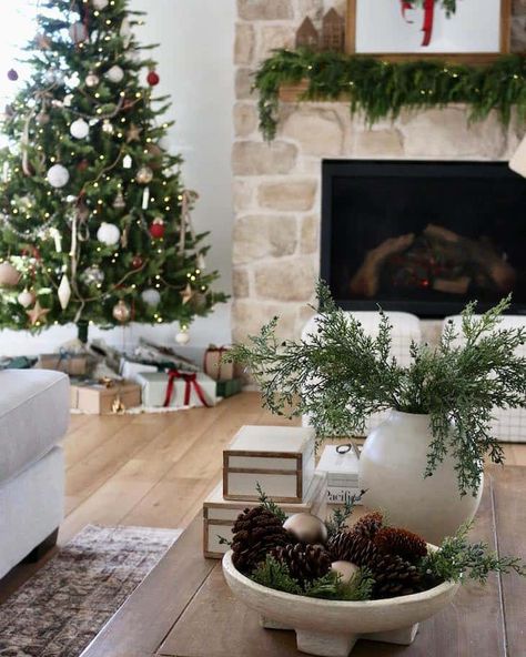 13 Must-Try Christmas Coffee Table Decor Ideas - Farmhousehub Christmas Decoration Sidetable, Christmas Coffee Table Vignettes, Holiday Decor Coffee Table, Winter Coffee Table Decor Ideas, Small Coffee Table Christmas Decor, Coffee Table Ideas For Christmas, Christmas Cocktail Table Decor, Decorating A Coffee Table For Christmas, Christmas Decor For Round Coffee Table