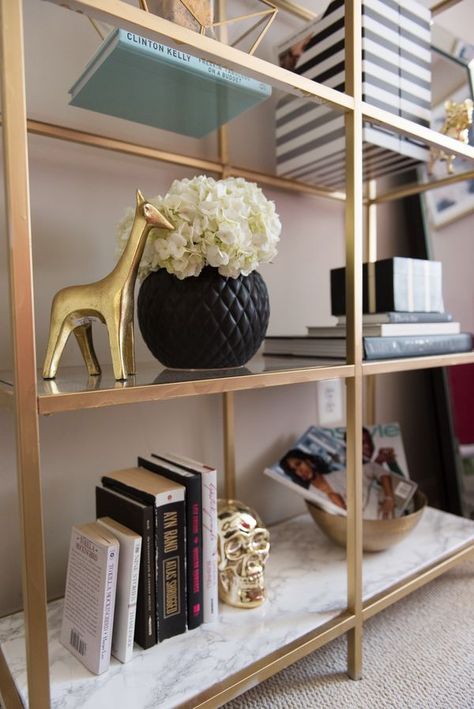 How to style a bookcase - shelves office space decor furniture Gold Bookcase Living Room, Gold Bookshelf Decor, Brass Bookcase, Diys For Your Room, Bookshelf Ikea, Gold Bookcase, Bookshelf Hack, Bookshelf Decorating Ideas, Ikea Shelf Hack