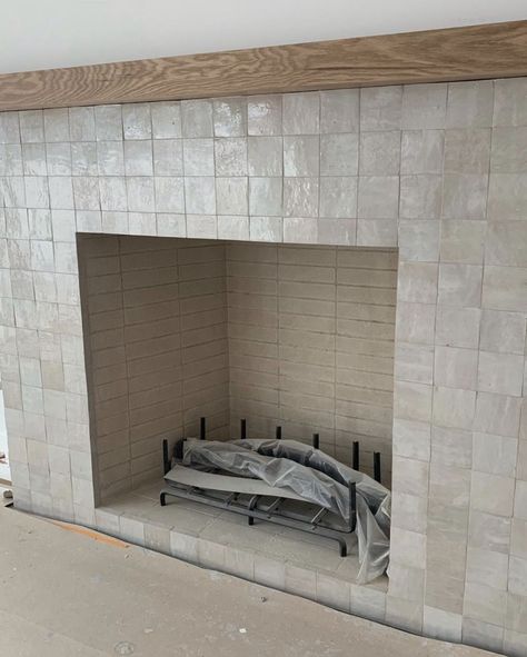 Natural White Zellige Tile, Herringbone Fireplace Surround, White Zellige Tile, Tile Around Fireplace, Herringbone Fireplace, Riad Tile, Tile Fireplace, Fireplace Tile Surround, Fireplace Logs