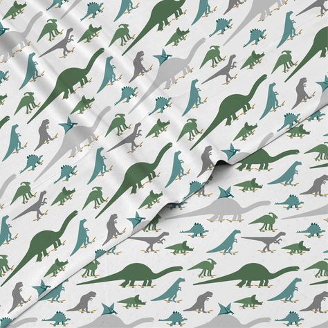 PRICES MAY VARY. 100% Brushed Microfiber Polyester ALL-INCLUSIVE SET: Introduce a prehistoric touch to your child's bedroom with the Dinosaurs sheet set! This enchanting set includes 1 twin flat sheet, 1 twin fitted sheet, and 1 queen pillowcase, all adorned with fun & skateboarding dinosaur prints. Made with soft, cozy fabric, your little one will enjoy a comfortable sleep surrounded by their favorite dinosaurs. Perfect for adding adventure to bedtime! Transform your child's room into a dino ha Dinosaur Sheets, Superhero Bedding, Kids Sheet Sets, Dinosaur Bedding, Kids Sheets, Twin Sheets, Twin Sheet Sets, Believe In Magic, Sheet Sets Queen