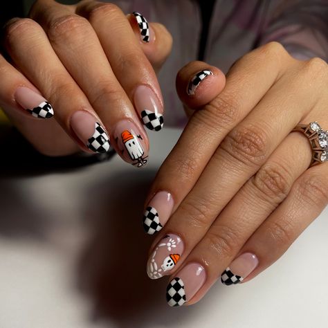 halloween nails w/ skeleton and ghost with beanies, and checkered nails! Nails were done by @fabdoesmynails on Instagram ! Halloween Girlie Nails, Cute Fall Nail Designs Acrylics, Fall Girly Nails, Cowgirl Ghost Nails, Cute Unique Nail Ideas, Nails Design Ideas 2024, Halloween Checkered Nails, How To Paint Checkered Nails, Groovy Halloween Nails