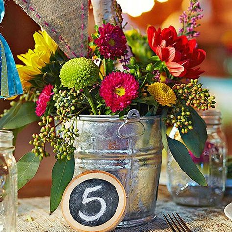 Wedding floral arrangement Wedding Glasses Diy, Bucket Wedding, Tin Buckets, Casual Bride, Frugal Wedding, Decorations On A Budget, Wedding Decorations On A Budget, Elegant Centerpieces, Wedding Centerpieces Diy