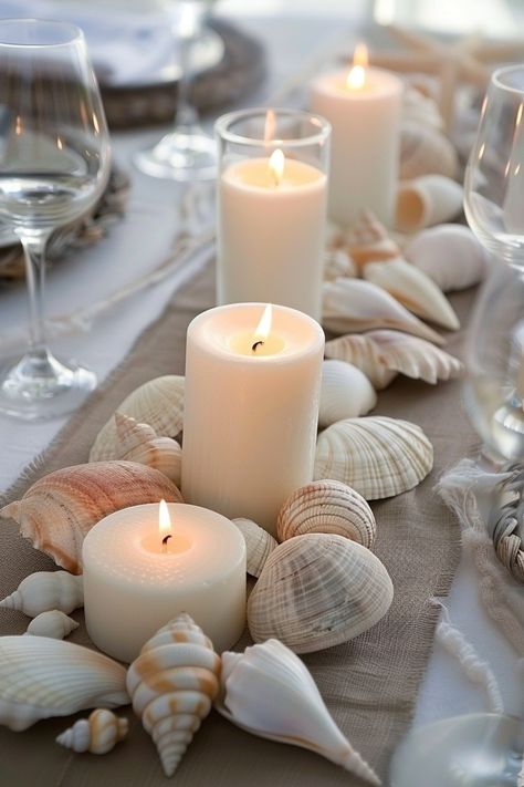 Create an enchanting tablescape that echoes the beauty of nature 🌿🌊. These eco-chic centerpieces blend earthly elements with the serenity of the sea, perfect for couples who love the environment. Ignite romance and sustainability on your special day! 🕯️❤️ #WeddingInspiration #EcoWedding #WeddingDecor #DIYWedding #SustainableLiving #SeasideTheme #NatureWedding #BohoChic Shell Centerpieces Table Decorations, Seashell Tablescape, Seashell Wedding Decor, Beach Table Settings, Sea Shell Wedding Decor, Chic Centerpieces, Candle Dinner Table, Shell Centerpieces, Seashell Wedding