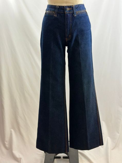 These 70s Vintage Viceroy jeans are super cool. High waisted, they have two zipper pulls, are flared and have great backstitching on oversized pockets. White tank approved. -Vintage 80s -Flared, dark wash, great stitch detailing -Machine wash recommended Measurements: *Waist 13 1/2 inches *Hips 18 1/2 inches *Inseam 30 1/2 inches *Length 40 inches *This item is pre-loved and there may be minor flaws to the garment. Not to worry if there is anything major we will let you know. --Please read shop 80s Jeans, Super Flare Jeans, Fits Aesthetic, Denim Flare Jeans, Fun Pants, High Waisted Jeans, 70s Vintage, High Rise Denim, Denim Flares