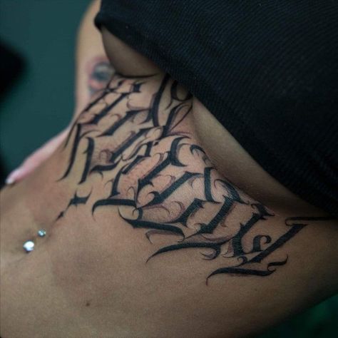 Stomach Tattoos Men Writing, Name On Stomach Tattoo, Sternum Script Tattoo, Chicana Stomach Tattoo, Female Stomach Tattoos Writing, Stomach Name Tattoo, Stomach Script Tattoo Women, Mexican Stomach Tattoo, Under Stomach Tattoo