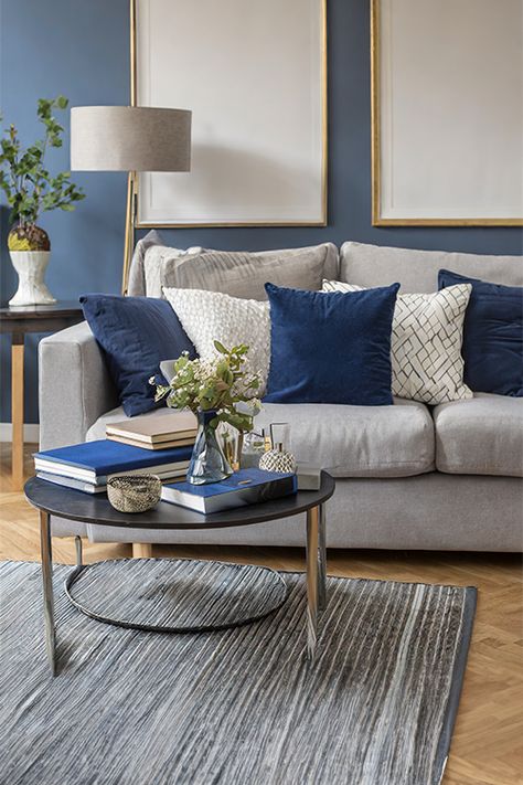 Gray Couch With Blue Accents, Blue Living Room Grey Sofa, Grey Couch Blue Pillows, Gray And Blue Aesthetic, Accent Wall Gray, Blue Aesthetic Home Decor, Dark Blue Accent Wall, Blue Aesthetic Home, Wooden Floors Living Room