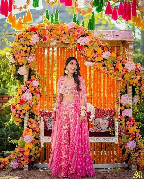 It’s fresh, available in various styles and designs. The type of lehenga which happens to be in our spotlight today is a Cape Lehenga. #shaadisaga #indianwedding #capelehengas #capelehengasinnet #latestlehengas #uniquelehengas #bridalcapelehengas #rufflelehengas #capelehengadesigns #partywearcapelehenga #plussizecapelehenga #stylishlehenga #lehengawithjacket #cape #jackets #deisgnerlehengas Mehandi Outfit, Mehendi Dresses, Mehndi Outfit, Mehendi Outfit, Mehndi Dresses, Mehendi Outfits, Mehndi Decor, Indian Wedding Planning, Bridal Jumpsuit