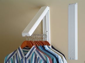 The InstaHanger installs into any wall using and rests flat against the wall when not in use. When open, it allows 12 inches of hanging space. It can to hold up to 60 lbs of clothes making it perfect for drying delicates in a laundry room or hanging extra coats when you have guests. Promising Review: "This is a great way to provide temporary hanging space. The hanging bar is a foot long and doesn't seem to mind the weight of any clothes I've hung up (including heavy jeans). It folds away disc... Laundry Closet Organization, Laundry Room Organization Storage, Utility Closet, Laundry Room Closet, Laundry Room Renovation, Clothes Hanging, Laundry Room Inspiration, Laundry Room Remodel, Laundry Room Diy