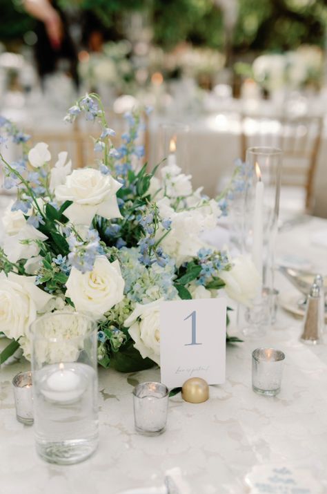 Dust Blue Wedding Centerpieces, Dusty Blue And Sage Centerpieces, July Flowers Wedding, Blue Wedding Decorations Receptions, Blue And White Flowers Table Decor, Wedding Table No Charger, Blue And Greenery Wedding, White And Blue Wedding Table, Dusty Blue Wedding Inspiration