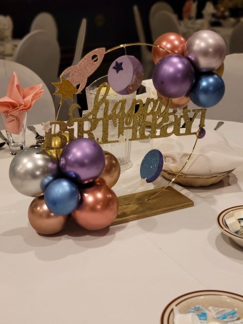 Space moon sun Galaxy Centerpiece Ideas Birthday, Outer Space Centerpiece, Diy Space Centerpiece, Planets Centerpieces, Space Balloon Centerpiece, Boy Birthday Centerpiece Ideas, Outer Space Centerpiece Ideas, Space Birthday Centerpieces, Planet Centerpieces