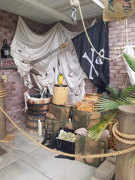 Pirate Homecoming Theme, Halloween Decorations Pirate, Pirate Themed Office Party, Halloween Shipwreck Diy, Pirate Office Decor, Halloween Pirate Theme, Haunted Pirate Ship Decorations, Pirate House Decor, Pirate Themed Halloween Decorations