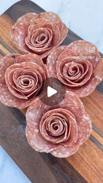 Emily Love Leserman on Instagram: "JC is the superior singer & turtleneck wearer Joey is the BEST dancer of the crew ⁣  what does this have to do with salami roses? I’m a millennial mom raised on lunchables who was taught the meaning of true romance by *NSYNC….it has EVERYTHING to do with salami roses" Meat Roses How To Video, Salmi Rose, Salami Roses How To Video, Flower Salami, Salami Roses How To, Salami Platter, How To Make Salami, Salami Rose, Liquor Bouquet