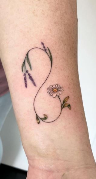 Stunning Infinity Tattoos, Designs, & Ideas - Tattoo Me Now Minimalist Tattoo Infinity, Intertwining Flower Tattoo, Infinity Tattoo Unique, Infinity Shamrock Tattoo, Infinity Tattoo Flowers Design, Infinity Tulip Tattoo, Dandelion Infinity Tattoo, Orchid Infinity Tattoo, Tulip Infinity Tattoo