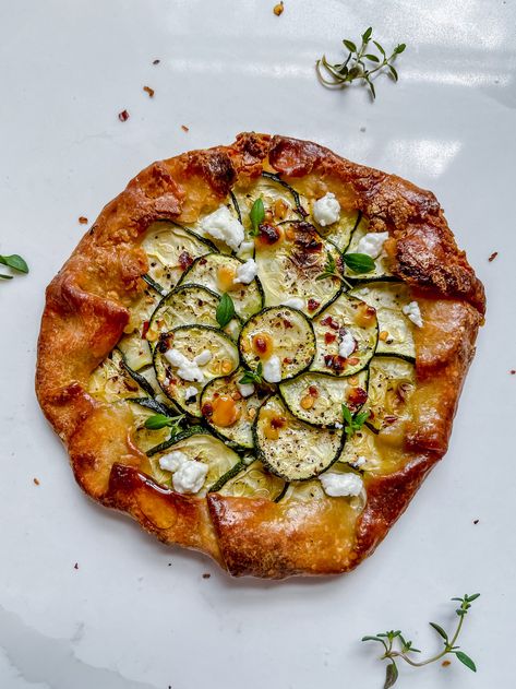 Zucchini & Goat Cheese Galette with Hot Honey & Thyme — All Types Of Bowls Zucchini Galette, Zucchini Goat Cheese, Goat Cheese Galette, Types Of Bowls, Spicy Zucchini, Cheese Galette, Vegan Diner, 2 Ingredient Dough, Goat Cheese Tart