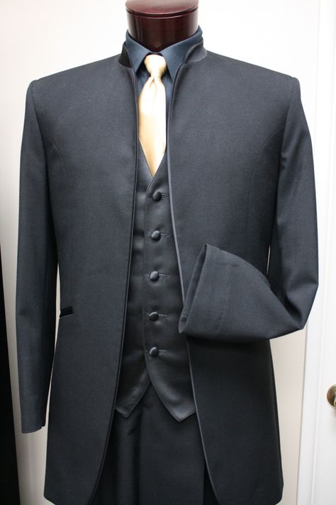 Mandarin Collar tux, supposedly with Tails. Trying to find a unique/modern take on the tuxedo, not much luck so far.  http://www.tuxandtails.com/miragemandarincollar.htm Masculine Wedding, Wedding Wear, Mandarin Collar, Wedding Suits, Suit Jacket, How To Wear, Clothes