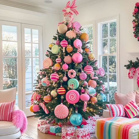 Transform your space into a holiday candyland with a tree decorated with large lollipops, candy canes, and pastel accents. The whimsical design makes Christmas more magical. Candy Wonderland, Large Lollipops, Whimsical Christmas Decor, Christmas Trees Decorations, Gingerbread Theme, Decorating Hacks, Whimsical Christmas Trees, Traditional Holiday Decor, Whimsical Christmas