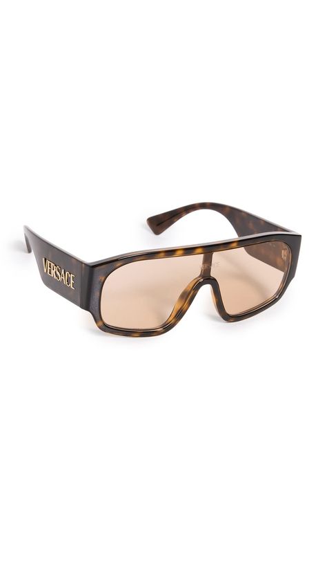 PRICES MAY VARY. Gold-tone logo lettering Height: 2.5in / 6.5cm, Lens Width: 60mm, Width: 5.75in / 14.5cm Hardshell case included Non-polarized lenses Aviator frame 0VE4439 Aviator Sunglasses Luxury Rectangular Aviator Sunglasses With Tinted Lenses, Luxury Shield Sunglasses, Luxury Tinted Aviator Sunglasses, Luxury Vintage Aviator Sunglasses With Tinted Lenses, Luxury Gold Tinted Aviator Sunglasses, Burberry Astley Sunglasses, Designer Brown Tinted Sunglasses, Sunglasses Brown, Brown Lens