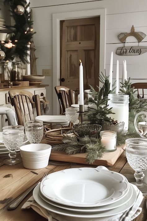 Create a charming and rustic holiday table with our farmhouse Christmas dinner decor ideas. Our article offers tips on how to bring a touch of country charm to your dining room, using elements like burlap table runners, wooden chargers, and mason jar centerpieces filled with greenery and berries. Add touches of red and white gingham and simple, earthy tones to create a cozy, inviting atmosphere that’s perfect for a festive meal. Whether you’re hosting a large family gathering or a small, ... Christmas Table Setting Ideas, Christmas Dining Table Decorations, Christmas Dinner Decorations, Wooden Chargers, Dining Table Decorations, Christmas Dining Table Decor, Holiday Table Centerpieces, Table Setting Ideas, Christmas Table Setting