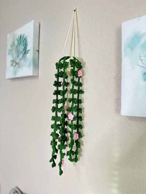 Introduce a touch of elegance and creativity to your home with Handmade Crochet Plant Wall Art. Featuring meticulously crocheted fake flowers and leaves, this wall hanging is a perfect blend of art and nature. Ideal for boho-themed rooms, it adds a unique and sophisticated touch to your bedroom, office, or living room. The soft, natural colors complement any decor, while the handmade quality ensures each piece is one-of-a-kind. Bedroom Accents, Vibe Bedroom, Home Boho, Unique Home Accessories, Crochet Plant, Handmade Wall Hanging, Bedroom And Office, Plant Wall, Unique Home