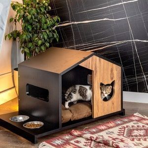 Nestled in Amazon's cat beds, a tale of comfort is told. Modern Dog Houses, Chat Diy, Wooden Cat House, Cat Houses Indoor, Niche Chat, Wooden Dog House, Outdoor Dog House, Cat Kennel, Cat House Diy