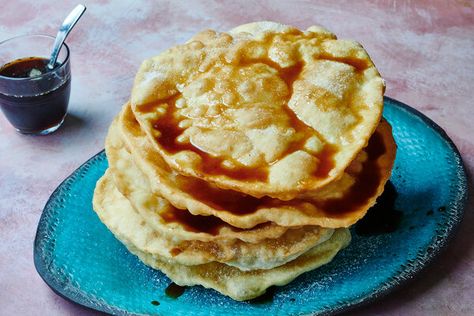 Mexican Buñuelos With Piloncillo Syrup Recipe - NYT Cooking Mexican Bunuelos, Mexican Bunuelos Recipe, Bunuelos Recipe, Soul Recipes, Hungry Girl Recipes, Baking Lessons, Bread And Pastry, Eggs Breakfast, Mexican Home