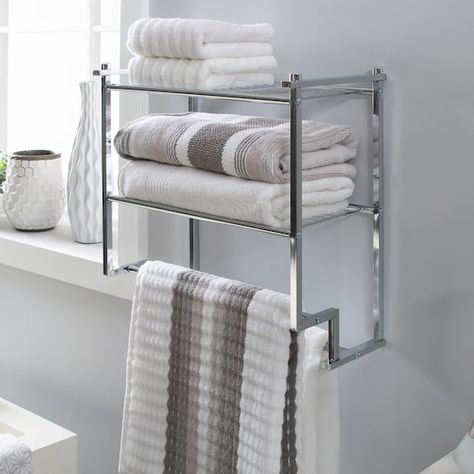 Shop Organize It All 2-Tier Wall Mounted Shelf & Towel Rack at Michaels. com. This attractive storage solution will spruce up your bathroom and keep things calm and organized. Add a stylish touch to your bathroom with this wall mounted shelf and towel bar. The perfect addition to create space and style. Sturdy wire shelves and a towel bar on the bottom. Use the shelves for décor or storing towels and bath products, maximizing the space in your bathroom. Designed with a chrome finish making t Chrome Bathroom Shelves, Fireplace Shiplap, Bathroom Downstairs, Redecor Game, Wall Towel Racks, Contemporary Bathroom Decor, Storing Towels, Shelves Ideas, Wire Shelves