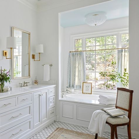 Birmingham Home & Garden (@birminghamhomeandgarden) • Instagram photos and videos Tub In Front Of Window, Built In Tub Master Bath, Southern Bathroom, Bathroom Counter Decor, Bubble Baths, Brass Sconces, Cottage Bathroom, Schumacher Fabric, Tile Floors