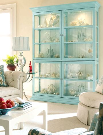 If you happen to have large sea collections, like me, (from all the beaches you've been too), organizing them in glass cabinets could be a great choice. This cabinet is from Century, but I may just paint my old china cabinet this pretty color for our beach place. :) Beach Inspired Living Room, Dream Beach Houses, Glass Cabinets Display, New Traditional, Beach Living, Coastal Cottage, Inspired Living, Beach Inspired, A Living Room