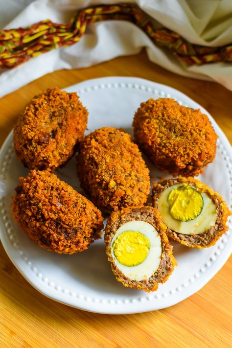 Nigerian Scotch Eggs Recipe - Dash of Jazz Nigerian Jollof Rice Recipe, Deviled Egg Dip, Nigerian Jollof Rice, Jollof Rice Recipe, Scotch Eggs Recipe, Southern Deviled Eggs, Egg Calories, Deviled Eggs Classic, Ripe Plantain