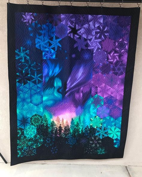 Carrie Hanks | Quilt made for my husband for Christmas. He wants to go see the northern lights, so this will have to do until we can go. Made with 7… | Instagram Aurora Borealis Quilt, Northern Lights Quilt, Northern Lights Quilt Pattern, Northern Lights Quilts, Storm At Sea Quilt, Camping Quilt, One Block Wonder, Sea Quilt, Stained Glass Quilt