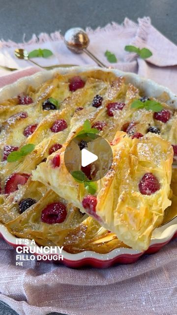 Vesela Asenova| Recipe Creator on Instagram: "Berry Soufra is a crunchy, buttery Phyllo dough pie baked with custard and berries and it simply melts in your mouth! 
Ingredients: 
10 oz phyllo dough 
7 tbs salted butter, melted 
6 oz berries of choice 
Powder sugar, for dusting
Mint leaves, for garnish 

Custard 
3 eggs 
1/2 cup sugar
1 cup milk 
1/2 cup heavy whipping cream 
1 tsp vanilla bean paste/extract 

Method: 
1. Preheat oven at 400 F; 
2. Brush melted butter on your baking/pie pan; brush butter in the first phyllo sheet and place it on the pan; butter the next phyllo sheet, crinkle it and place it on the pan; repeat for all phyllo sheets; brush remaining butter on top and bake for about 10-12 minutes or until golden; 
3. Beat egg with sugar, vanilla, milk and cream and pour over; Phyllo Dough Pie, Phyllo Cake, Dessert Pizza Fruit, Phyllo Recipes, Baking Pie, Cinnamon Roll Recipe Homemade, Vanilla Bean Paste, Veal Recipes, Puff Pastry Desserts