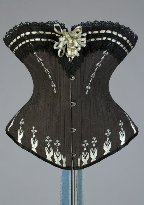 Black corset trimmed with pale blue flossing and ribbons, Polish, 1880s, KSUM 1983.1.1500 Corset Flossing, 1890s Corset, Victorian Corsets, 1889 Fashion, Edwardian Corsets, 1880s Fashion, Victorian Corset, Lingerie Vintage, 19th Century Fashion