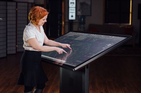 Ideum Drafting Table 65 | The Drafting Table 65 is the first to incorporate 3M™ projected-capacitive touch technology. It is a fully integrated system that incorporates a large multitouch screen, oriented to a 30-degree angle. The Drafting Table 65 P-CAP is impervious to light interference and supports up to 60 touch points for multi-user interaction. Multitouch Table, Luxury Bunkers, Touch Screen Table, Interactive Table, Drawing Desk, Drafting Table, Touch Table, Solar System Planets, Home Decor Crate