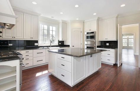 Black Granite Countertops (Colors & Styles) - Designing Idea Kitchen Without Backsplash, Refacing Kitchen Cabinets Cost, Period Fireplace, Off White Kitchen Cabinets, Uptown Dallas, Antique White Kitchen Cabinets, White Cabinets White Countertops, White Kitchen Countertops, Cost Of Kitchen Cabinets