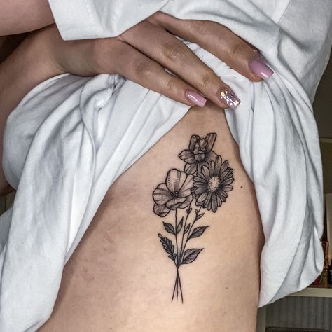 Flower tattoo. Simple bunch. Dainty. Lily. Daffodil. Sunflower. Ribcage Daisy Cover Up Tattoo, Sunflower Bunch Tattoo, Bunch Of Flowers Tattoo, Daisy Tattoo, Sunflower Tattoo, Cover Up Tattoo, Forearm Tattoo, Bunch Of Flowers, Body Mods