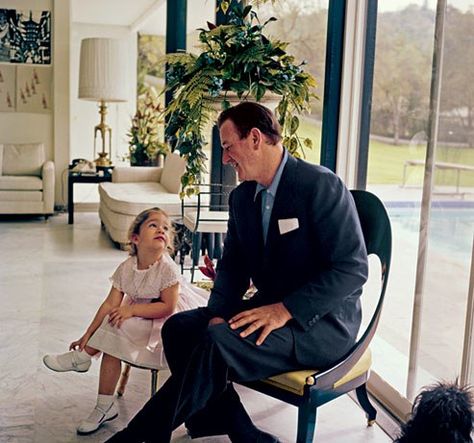 Aissa and her famous dad in the sleekly modern poolhouse. "My mom always told me to cross my legs for pictures. I can tell that my right hand is helping the leg stay." Duke Wayne, Ben Johnson, Wayne Family, Tv Icon, Actor John, San Fernando Valley, American Icons, I John, John Wayne