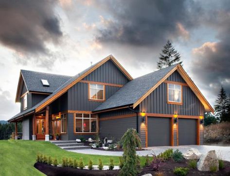 Wood Trim On Exterior Of House, Houses With Wood Trim Exterior, West Coast Exterior House Colours, Houses With Natural Wood Trim, Dark Grey House Exterior Wood Trim, Black House Natural Wood Trim, Light Gray Exterior With Wood Accents, Dark House Natural Wood Exterior, Wood Trim Windows Exterior