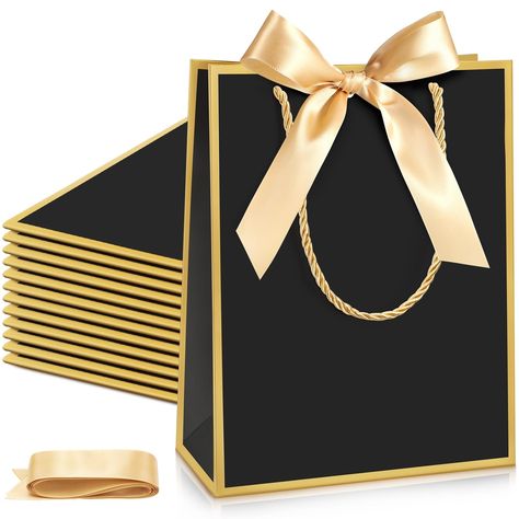 PRICES MAY VARY. Sufficient Quantity: this package comes with 24 pieces of bridal shower gift bags, the quantity is sufficient to meet your daily usage and replacement needs, you can also share them with others Elegant Design: the black handheld gift bags are designed with gold rims, matching with bow ribbons, look elegant and stylish, can better attract people's attention and leave a deeper impression on others; There is no text on the gift bag, you can write your blessing on the bag to express Wedding Personal Touches, Bridal Shower Gift Bags, Holiday Favors, Ribbon Diy, Bows Diy Ribbon, Holiday Gift Bag, Diy Gift Wrapping, 15 Gifts, Bow Ribbon