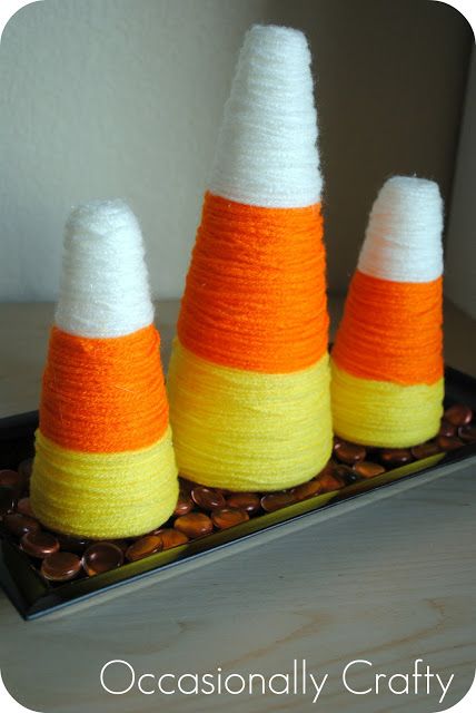 Yarn-Wrapped Candy Corn Decoration | Occasionally Crafty: Yarn-Wrapped Candy Corn Decoration Corn Table, Thanksgiving Thoughts, Spooky Diy Halloween Decor, Halloween Party Cups, Corn Decor, Candy Corn Crafts, Diy Halloween Party, Candy Corn Decorations, Pumpkin Candle Holder